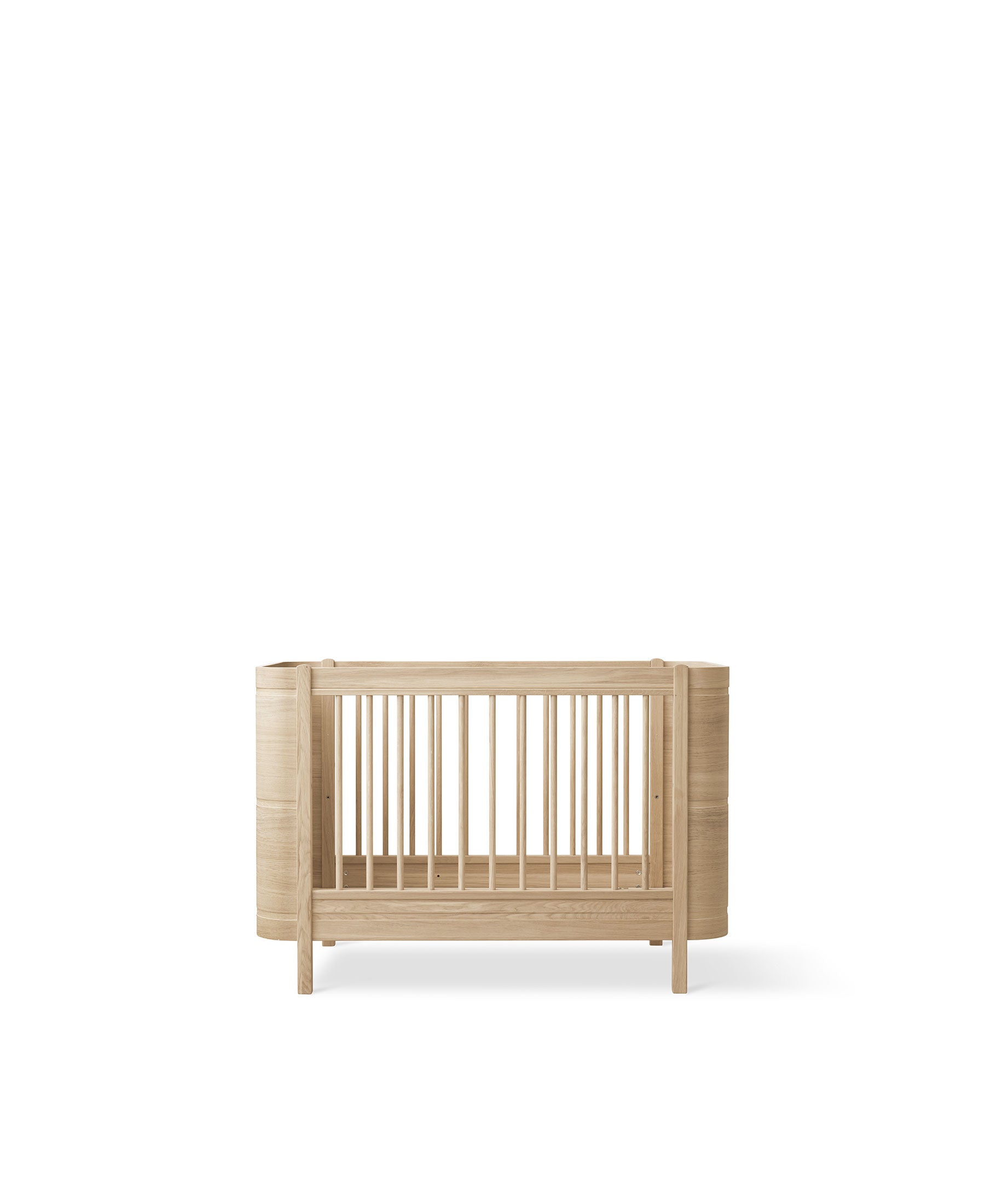 Wood Mini+ cot bed incl. junior kit, oak