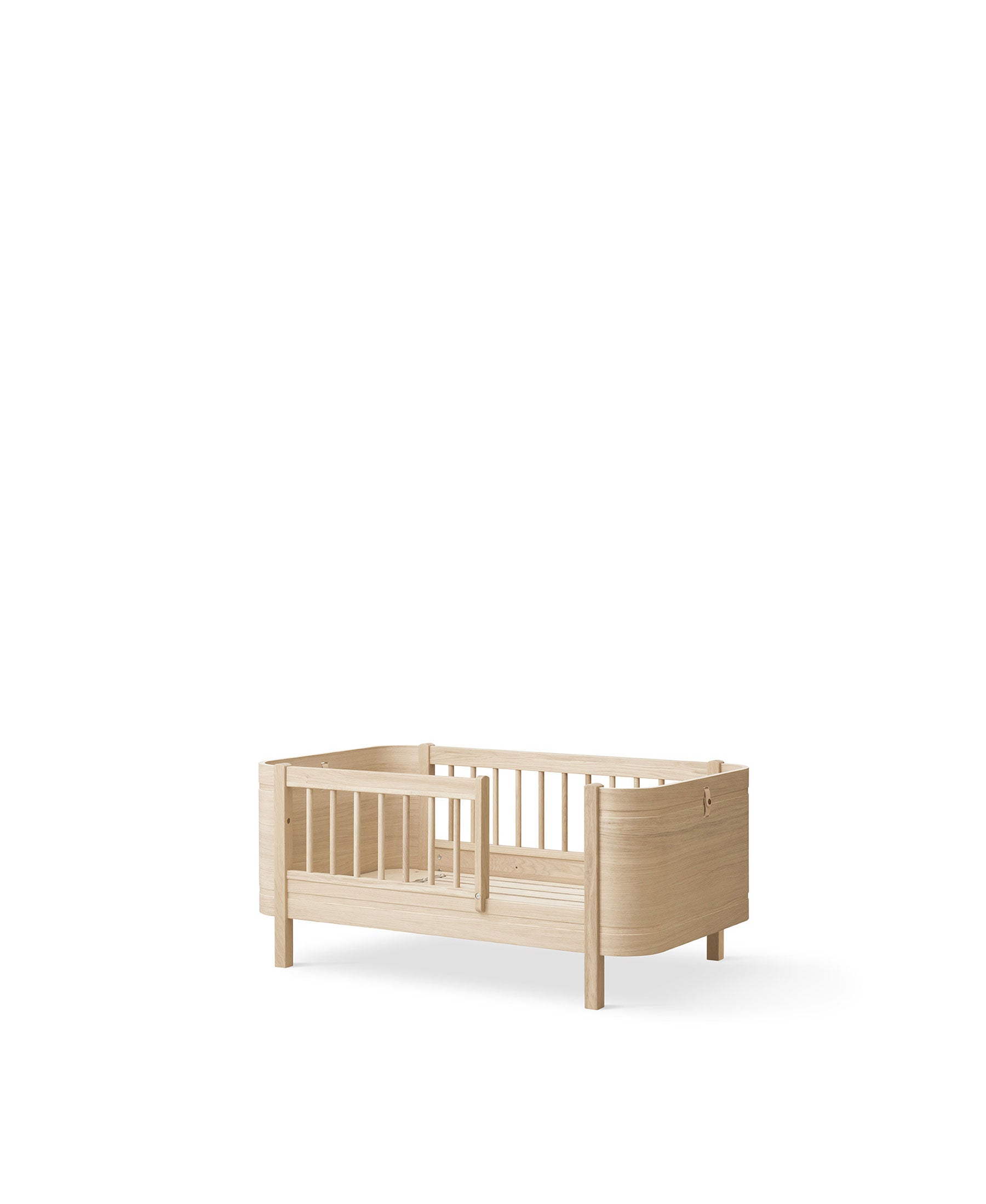 Wood Mini+ cot bed incl. junior kit, oak