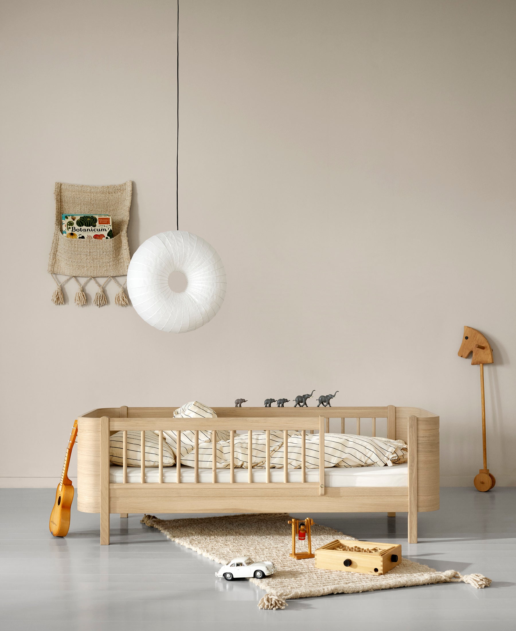 Wood Mini+ cot bed incl. junior kit, oak